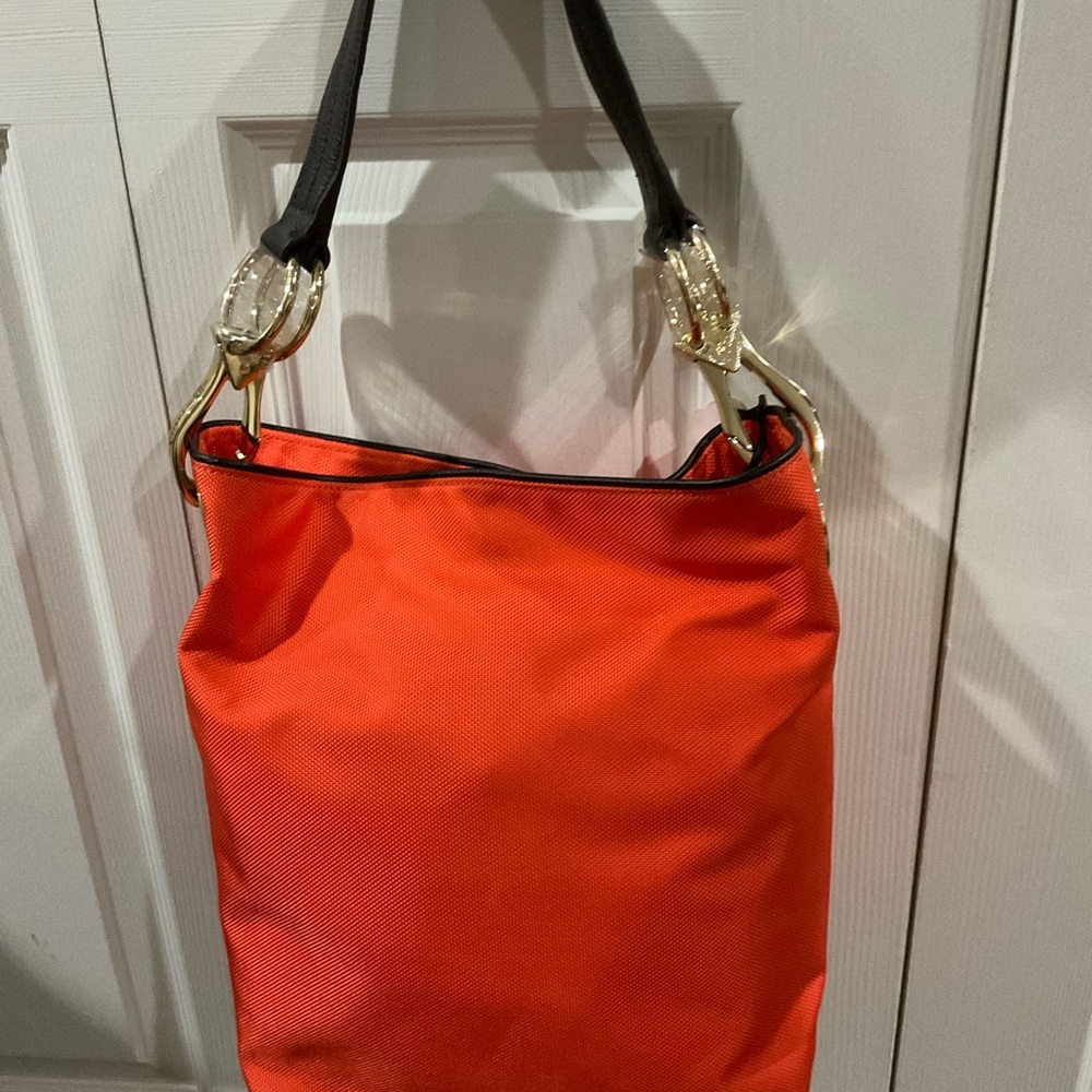Vibrant Orange Shoulder Bag with Adjustable Straps and Gold Hardware